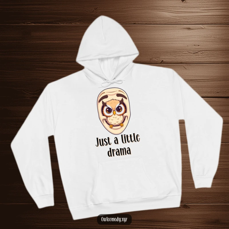 Funny curious owl peeking from a comedy mask, captured on a warm and cozy hoodie, radiating humor.