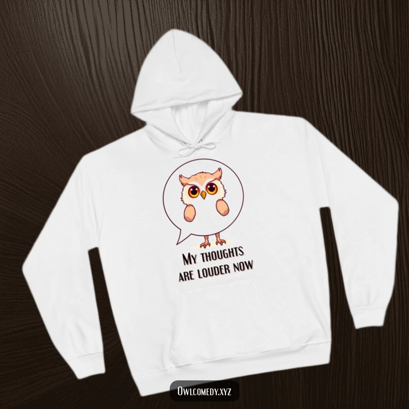 Funny Hoodie: A curious owl is captured peeking playfully from behind a large speech bubble, offering a humorous and cozy vibe.