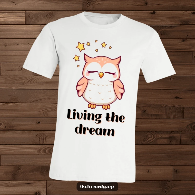 Funny dreaming kawaii owl t-shirt, with closed eyes and a swirl of stars above its head, a cozy and humorous graphic tee.
