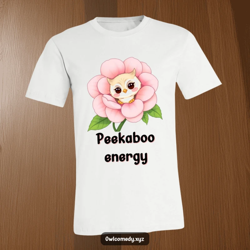 Funny shy kawaii owl t-shirt, peeking around a giant flower with a faint blush, a sweet and humorous graphic tee.