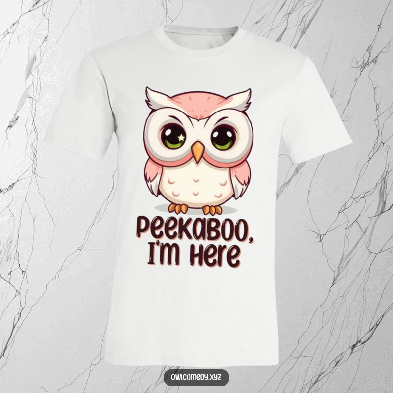 Funny Comedy Mask Owl T-Shirt with a kawaii owl's large, sparkling eye peeking from behind a big comedy mask.